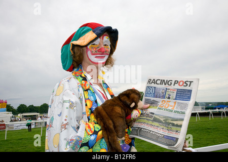 Horse racing event attended by Stevie (MR) the professional Clown and puppet at Corporate race meeting at Perth Racecourse, Tayside, Scotland uk Stock Photo