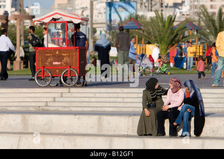 Tripoli, Libya, North Africa. Modern Libyan Women's Clothing Styles,  Public Park near the Green Square.  Girls Talking. Stock Photo