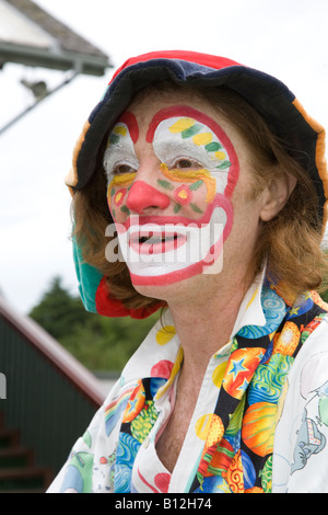Horse racing event attended by Stevie (MR) the professional Clown and puppet at Corporate race meeting at Perth Racecourse, Tayside, Scotland uk Stock Photo