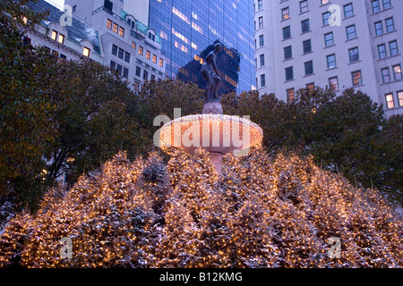 CHRISTMAS TREES  PULITZER FOUNTAIN PLAZA HOTEL (©HENRY J HARDENBERGH 1907) MANHATTAN NEW YORK CITY USA Stock Photo