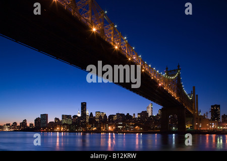 QUEENSBOROUGH BRIDGE MIDTOWN SKYLINE MANHATTAN NEW YORK USA Stock Photo