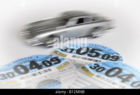 CAR WITH BRITISH ROAD TAX DISCS,UK. Stock Photo