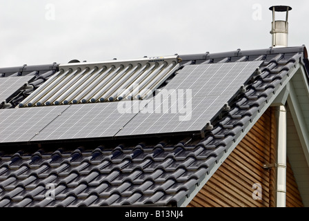 Newly built house with solar panels fitted to the roof, Bocklemund, Cologne, Germany. Stock Photo