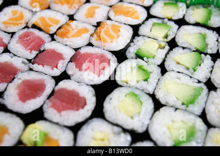 Maki Sushi made from avocados salmon and tuna full frame Stock Photo