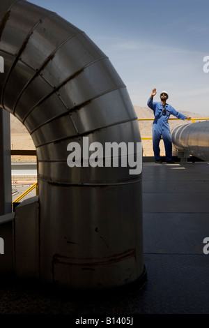 A worker on Bhit Gas Field Sindh Pakistan 2005 Stock Photo