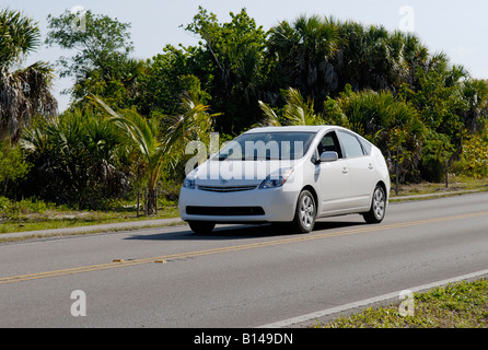 Gas-elecrtric hybrid car, Toyota Prius, on a road in Florida. Stock Photo