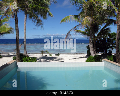 View from inside of high end resort's suite on Bora Bora island with it's own pool and beach outside the door. Photo Tom Zuback Stock Photo