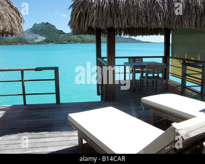 View from St. Regis resort suite of main island of Bora Bora, in the French Polynesian islands. Room is built over coral reef Stock Photo