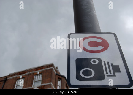 sign for london congestion charge with warning of camera , in chelsea, west london, england Stock Photo