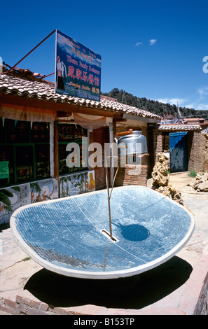 Solar powered teapot at a Tibetan family restaurant in the Chinese village of Langmusi. Stock Photo