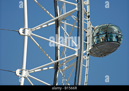 Close up on a section of the main wheel and one of the passenger cabins on the London Eye River Thames South Bank London UK Stock Photo