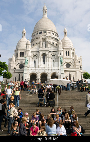 Tourists walking the stairs to Sacre Coeur basilica Montmartre Paris Stock Photo