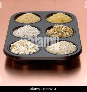 Variety of oat bran in baking dish Stock Photo