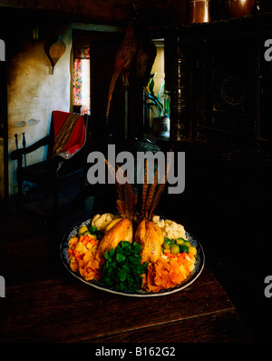 Roast pheasant with vegetables Stock Photo