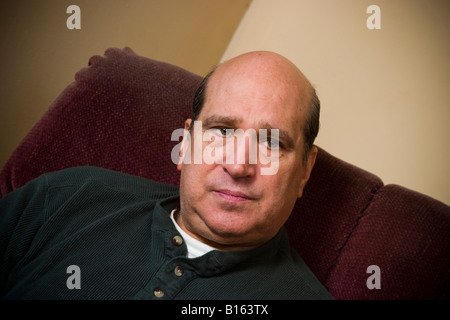 Middle age balding man posing MODEL RELEASED Stock Photo