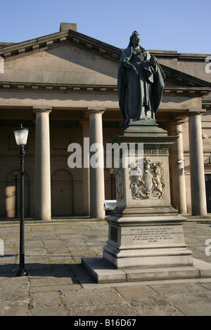 City of Chester, England. Queen Victoria statue with the Thomas Harrison designed Assize Court portico at Chester Crown Court. Stock Photo