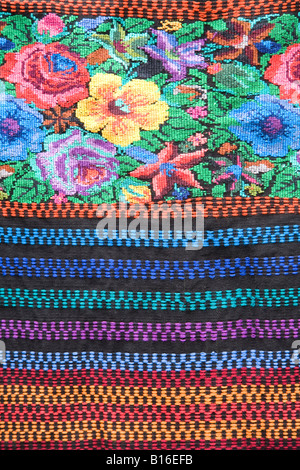 Brightly coloured fabric woven by a Mayan woman Stock Photo