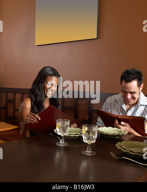 Multi-ethnic friends at restaurant Stock Photo