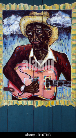 A painting of famed American blues singer and composer Robert Johnson on wooden doors, Pai, Thailand. Stock Photo