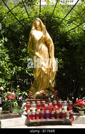 Opatija Istria Croatia Europe May The gilded statue of Madonna in front of St Jacob's Church in St Jacob's Park Stock Photo