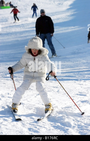 eight year old boy learning to ski Stock Photo