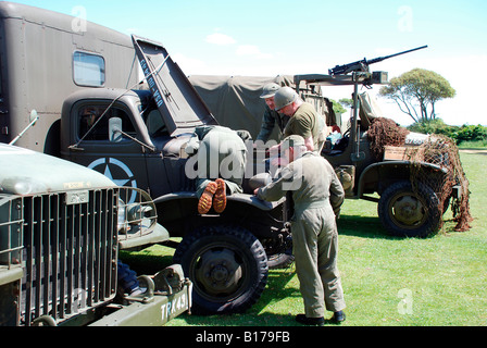 WW2 mechanics working on lorry at D-day reenactment lepe beach hampshire Stock Photo