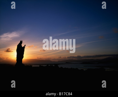 Sculpture of St. Patrick, and view of Clew Bay from Croagh Patrick, Co Mayo, Ireland Stock Photo