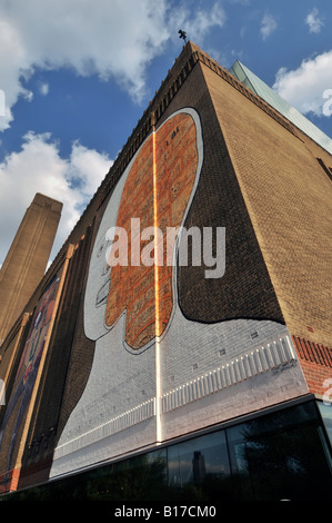 Tate Modern external brick walls used for street art display of graffiti on this revamped power station Stock Photo