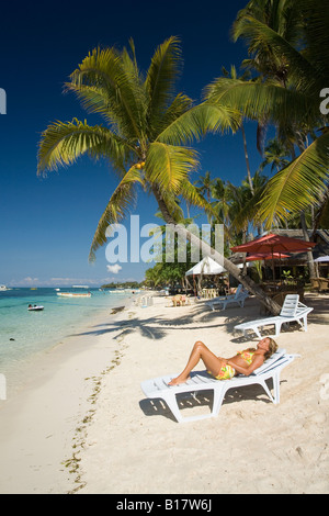 relaxing on the Alona Beach Panglao Island Bohol Philippines Stock Photo