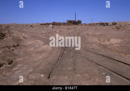 Diamond crossing in railway tracks leading to abandoned nitrate mining processing plant of Santa Laura, near Iquique, Chile Stock Photo