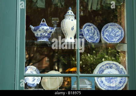 Antique shop window with blue and white china Stock Photo