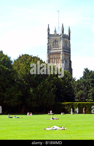 The tower of the parish church of St John the Baptist seen from the Abbey Grounds in Cirencester, Gloucestershire, England Stock Photo