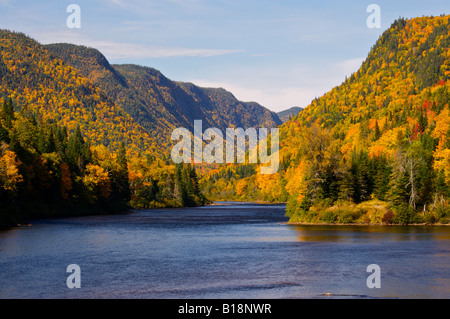 Riviere Jacques-Cartier, Jacques Cartier River, and valley surrounded by fall colours in Parc de la Jacques-Cartier, Quebec, Can Stock Photo
