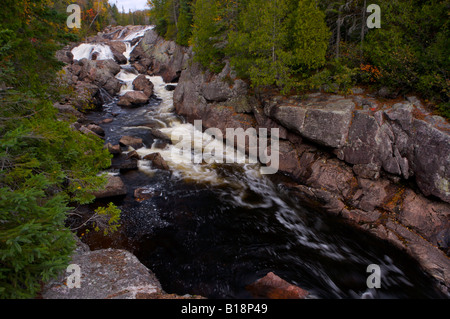 Waterfall along the Sand River, Pinguisibi Trail, in Lake Superior Provincial Park, Great Lakes, Ontario, Canada. Stock Photo