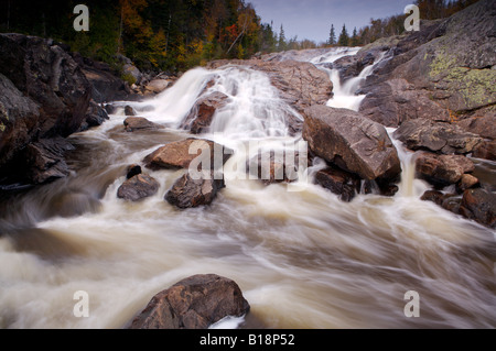 Waterfall along the Sand River, Pinguisibi Trail, in Lake Superior Provincial Park, Great Lakes, Ontario, Canada. Stock Photo