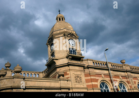 The red brick facade and clock tower of Victorian Leicester London Road Midland Railway Station opened in 1840 Stock Photo