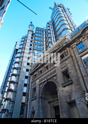 The entrance to the first Lloyd's building stands in sharp contrast to Richard Rogers postmodern towers. Stock Photo