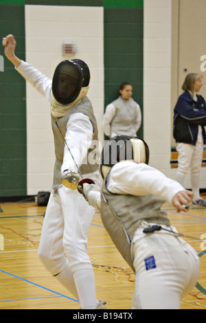 SPORTS Gurnee Illinois USFA sectional fencing competition two male competitors in match Stock Photo