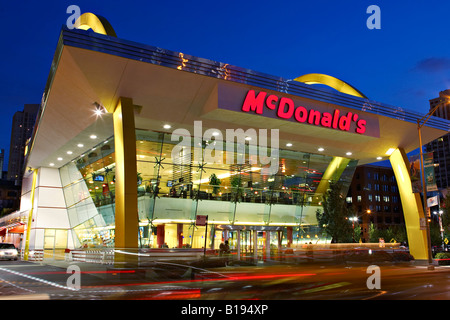 STREET SCENE Chicago Illinois McDonald s restaurant on Ontario Street at night Golden Arches in River North Stock Photo