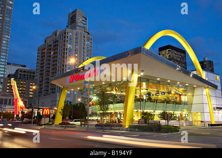 STREET SCENE Chicago Illinois McDonalds two story restaurant on Ontario Street River North at dusk trademark logo Golden Arches Stock Photo