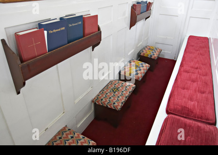 MASSACHUSETTS Boston Boxed pew in Old North Church hymnals in rack pad on pew North End neighborhood Stock Photo