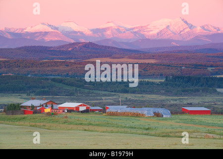 Ranch at sunrise in the foothills, Seebe, Alberta, Canada Stock Photo