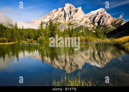 Mount Kid reflected in Wedge Pond, Kananaskis Provincial Park, Alberta, Canada Stock Photo