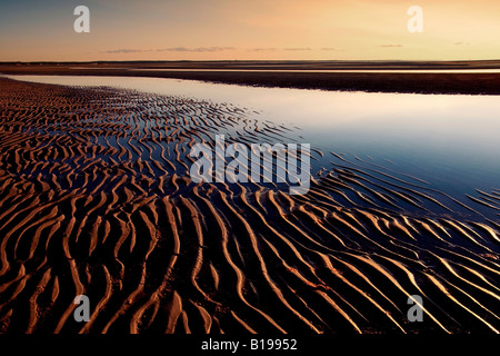 Ripples in Sand on Beach at Sunset, First Encounter Beach, Eastham, Cape Cod, Massachusetts, USA. Stock Photo