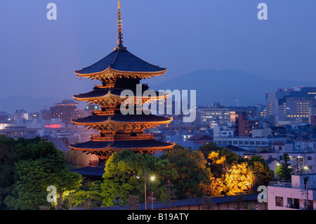 city skyline with Toji temple glowing in the evening Kyoto Japan Stock Photo