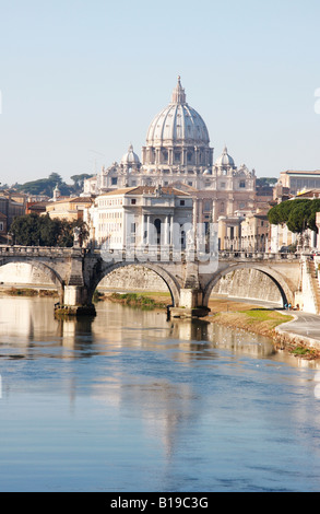 spectacular view of St Peters,Vatican,City,along the length of theTiber River in Rome is reflected in it's calm water Stock Photo