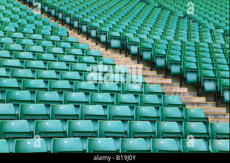 Rows of empty seats in a sports stadium Stock Photo