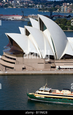 A harbour ferry passes the Sydney Opera House Stock Photo