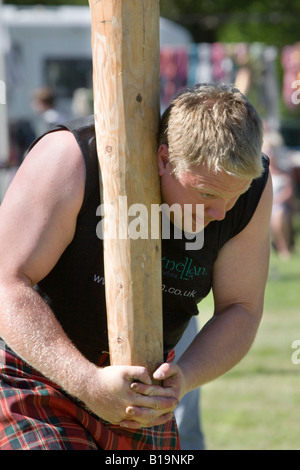 The caber toss, a traditional Scottish athletic event. Highland Games ...