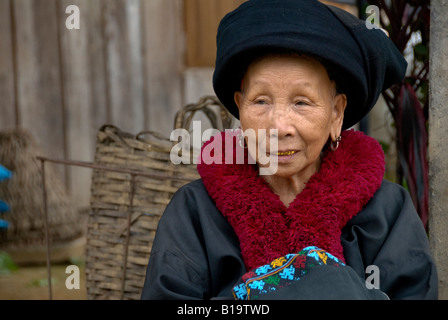 Old woman of the Mien hill tribe in northern Thailand wearing ...